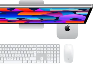 Mac mini colocada debajo de un monitor Studio Display, Magic Keyboard con teclado numérico, Magic Mouse